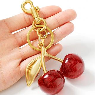 Chaveiro de cereja COACH