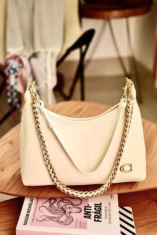 Bolsa transversal feminina